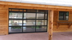 Tilt-up canopy garage doors